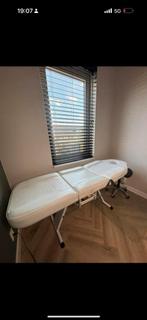 Behandelstoel, Ophalen, Massagetafel
