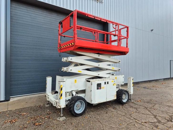 Genie GS3369RT 12 meter Ruwterrein schaarlift hoogwerker, Zakelijke goederen, Machines en Bouw | Liften, Steigers en Ladders