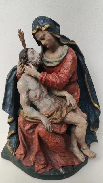 Houten pietà met polychromie beschikbaar voor biedingen