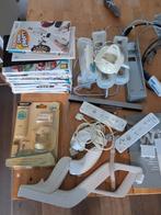 Wii spelcomputer met games , controllers en balance board, Ophalen of Verzenden, Zo goed als nieuw, Met 2 controllers, Met games