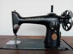 Singer 201K naaimachine in tafel, Ophalen