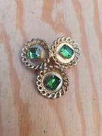 Goudkleurige vintage broche met groene stenen, Ophalen of Verzenden