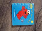 Boek Wat doet Elmo, Ophalen of Verzenden, Zo goed als nieuw, Prentenboek