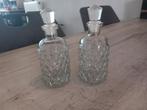2 glazen stopflesjes, Ophalen