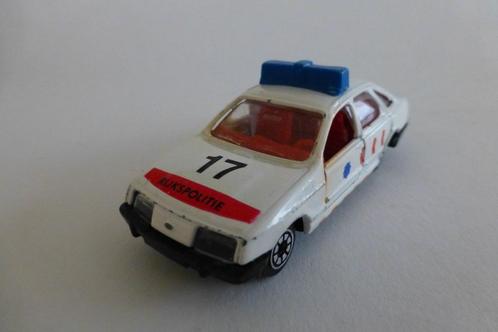 Edocar Ford Sierra rijkspolitie, Hobby en Vrije tijd, Modelauto's | Overige schalen, Zo goed als nieuw, Auto, Ophalen of Verzenden