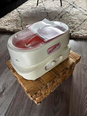 Parafine verwarmer Depilève | nagelstyliste beschikbaar voor biedingen