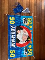 Abraham 50 jaar spandoek + blauwe slingers, Ophalen of Verzenden, Gebruikt, Versiering, Abraham of Sarah