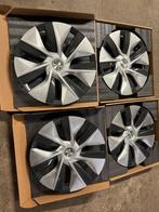 Tesla wieldoppen, Ophalen, Zo goed als nieuw