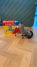 Antieke blikken springende zebra, Ophalen of Verzenden