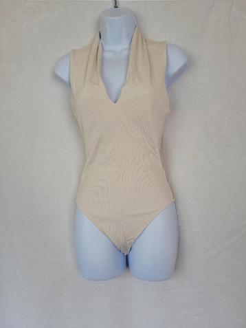 Leuke cremekleurige body mt 36 merk H&M beschikbaar voor biedingen