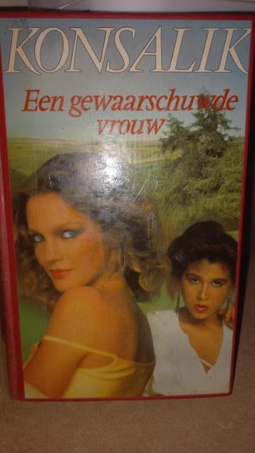 Konsalik - Een gewaarschuwde vrouw beschikbaar voor biedingen