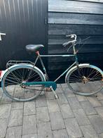 Het heren stads fiets, Ophalen