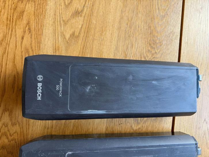 Accu Bosch Powerpack 500 En Powerpack 400 met lader 2A, Fietsen en Brommers, Fietsaccessoires | Fietsaccu's, Zo goed als nieuw