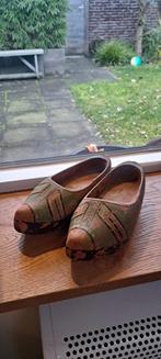 Oude houten klompjes, Ophalen