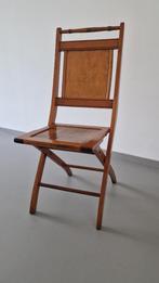 Houten stoel, Ophalen