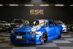 Nissan Skyline R34 GTR V-spec, Auto's, Nissan, Stof, Gebruikt, Zwart, Blauw