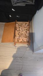 Houten blokken kar, Ophalen