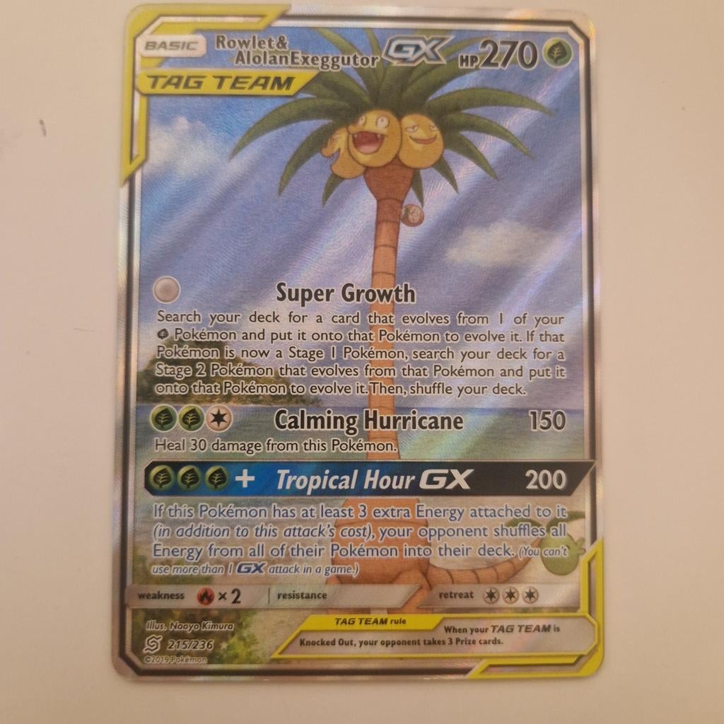 Rowlet & exeggutor tag team pokemon kaart, Ophalen of Verzenden, Zo goed als nieuw, Losse kaart