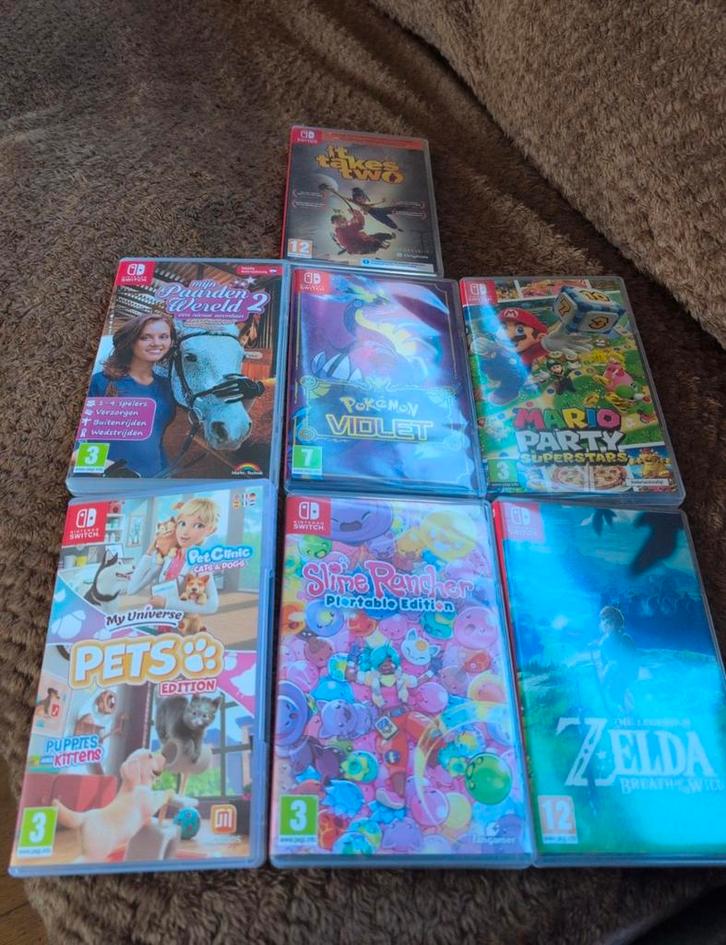 Nintendo Switch OLED + 7 spellen,controller,doos compleet, Hobby en Vrije tijd, Verzamelkaartspellen | Yu-gi-Oh!, Zo goed als nieuw