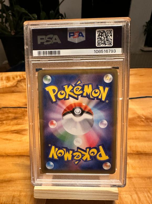 1st edition Charizard met handtekening Arita PSA 9, Verzenden, Zo goed als nieuw, Losse kaart