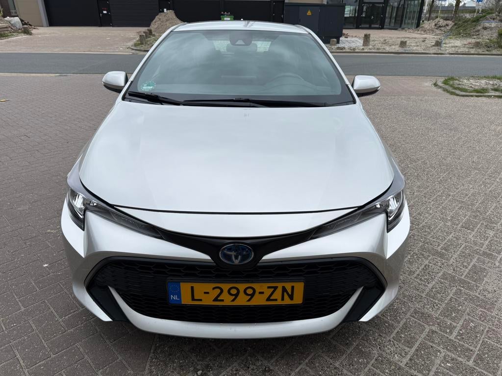 Toyota Corolla 1.8 Hybrid 122pk CVT 2021 Grijs, Auto's, Toyota, Corolla, Hybride Elektrisch/Benzine, 1320 kg, Te koop