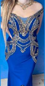 Blauwe Galajurk eyecatcher met gouden details maat M bieden, Kleding | Dames, Jurken, Verzenden, Zo goed als nieuw, Blauw, Onder de knie