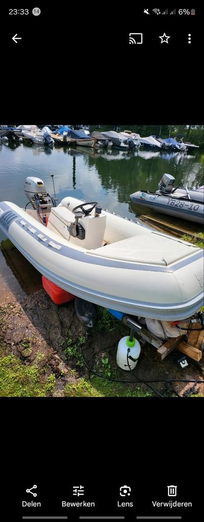 Zeer nette boot met trailer zonder plakkers met 15 pk motor, Watersport en Boten, Rubberboten, Gebruikt, Zodiac, Overige materialen