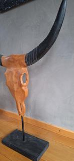 Houten waterbuffel hoorn, Ophalen