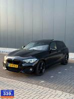 BMW 1-serie 120i Edition M Sport High Executive, Achterwielaandrijving, Gebruikt, 4 cilinders, Zwart