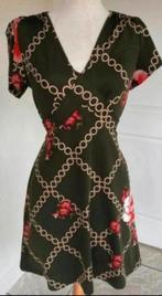 Aparte Groene king louie jurk,, M, Kleding | Dames, Jurken, Ophalen of Verzenden, Zo goed als nieuw