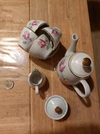 Klein theeservies met rozenmotief, Ophalen