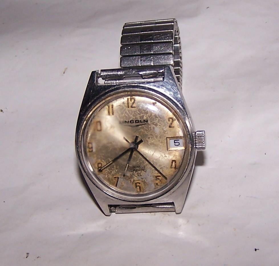 Vintage Lincoln opwindhorloge met datum. Zeer goed werkend., Ophalen of Verzenden