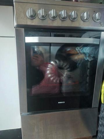 beko 4 pits gasfornuis met elektrische oven beschikbaar voor biedingen