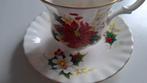 Royal Albert Poinsettia Teacup and saucer  Christmas, Ophalen of Verzenden, Zo goed als nieuw, Porselein, Kop en/of schotel