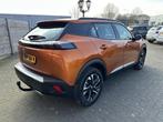 Peugeot 2008 1.2 PureTech Automaat | Afn. Trekhaak | Navigat, Gebruikt, Met garantie (alle), Leder en Stof, 1180 kg