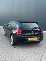 BMW 1-Serie 116i Automaat 2012 inruil mogelijk!, Auto's, BMW, 65 €/maand, 4 cilinders, Zwart, 650 kg