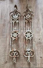 Wandornament 2x , gietijzer, Ophalen