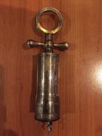 Antieke kurkentrekker., Ophalen