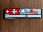 4384 Sticker Etiket Zwitserland en USA, Ophalen of Verzenden, Zo goed als nieuw