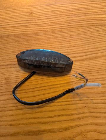 Achterlicht motor met kentekenplaatverlichting beschikbaar voor biedingen