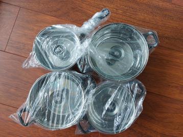 Nieuwe RVS pannenset 4 stuks met deksel inclusief 1 steelpan beschikbaar voor biedingen