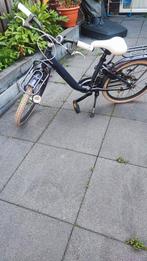 Donkere paars meisjes fiets. Merk batavus, Fietsen en Brommers, Fietsen | Meisjes, Ophalen of Verzenden, Zo goed als nieuw