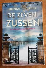 Boek Lucinda Riley: De Zeven Zussen *., Gelezen, Lucinda Riley, Ophalen of Verzenden, Nederland