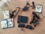 PlayStation 2 slim met 2 controllers, buzz contr. en spellen, Ophalen of Verzenden, Gebruikt, Zwart, Met 2 controllers
