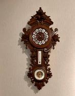 Hangklok met noten wijzerplaat ingelegd met parelmoer, Ophalen