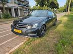 Mercedes-Benz C-Klasse 1.6 C180 Kompr. Sedan AUT 2014 Zwart, Auto's, Achterwielaandrijving, Zwart, Particulier, Sedan