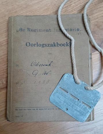 GEZOCHT: Oorlogszakboekje met herkenningsplaatje, WO2 beschikbaar voor biedingen