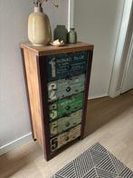 Stoer kastje met lades, Ophalen