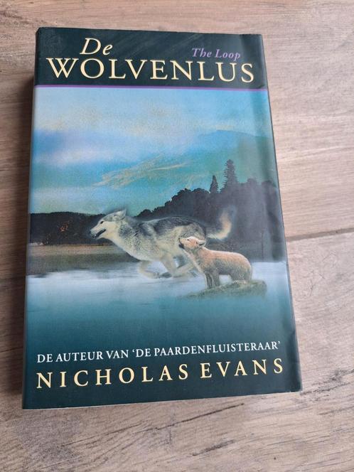 Roman de wolvenlus van Nicolas Evans, Boeken, Romans, Gelezen, Nederland, Ophalen of Verzenden