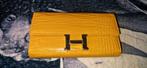 Hermes clutch portomonnee geel met gouden H, Overige merken, Gebruikt, Geel, Ophalen of Verzenden